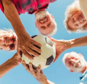 0001_senior-people-holding-a-soccer-ball_1737112937-b422812625d73e9ec456a604e8400a1f.jpg